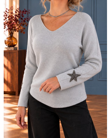 Pull gris clair étoile aux manches