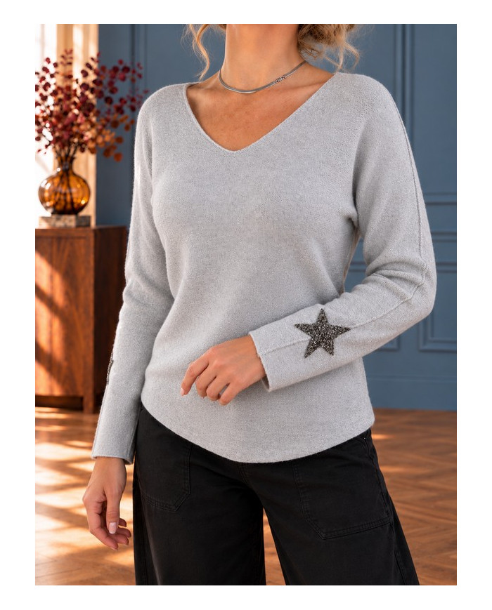 Pull gris clair étoile aux manches