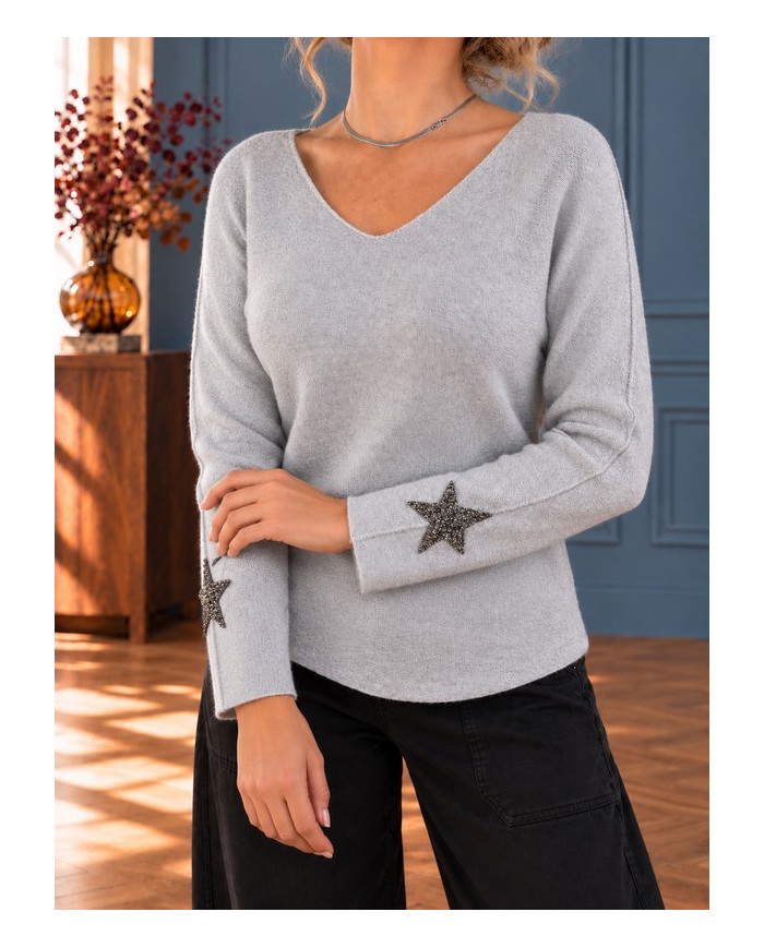 Pull gris clair étoile aux manches
